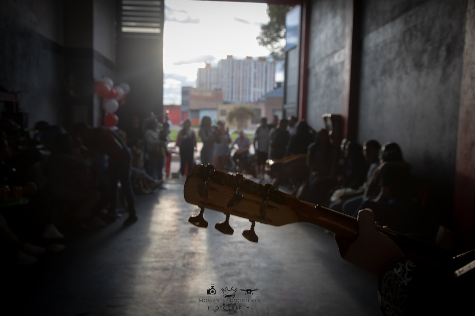Event crowd captured from musician’s stage view.